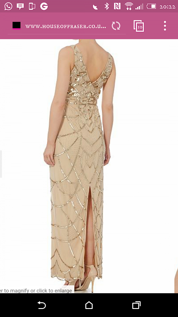gold sequence floor length dress and box clutch bag to match